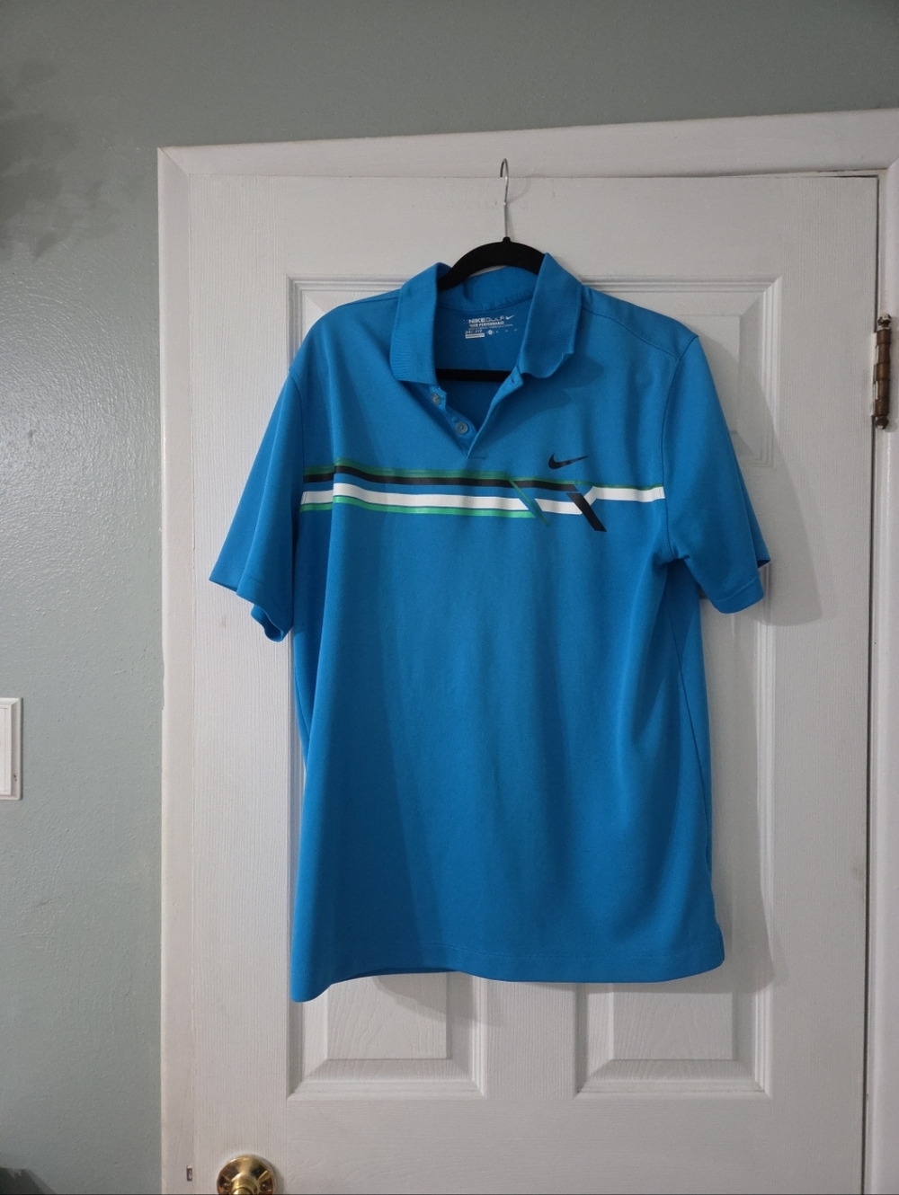 Nike Men’s Turquoise Polo with Multi-Stripe Chest and logo.  xl